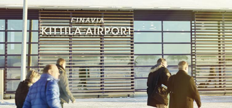 People walking in front of Kittilä airport.
