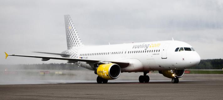 A Vueling airplane at runway.